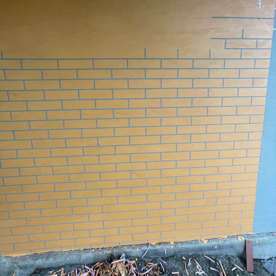імітація цегли на фасаді матеріали декоративна штукатурка
